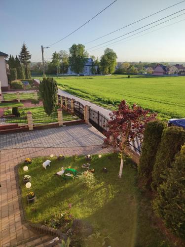 Κήπος έξω από το Apartament nad Nidą