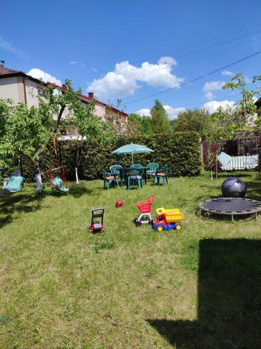 Κήπος έξω από το Apartament nad Nidą