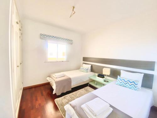 Ліжко або ліжка в номері Vilamoura Central 2 Bedroom Flat