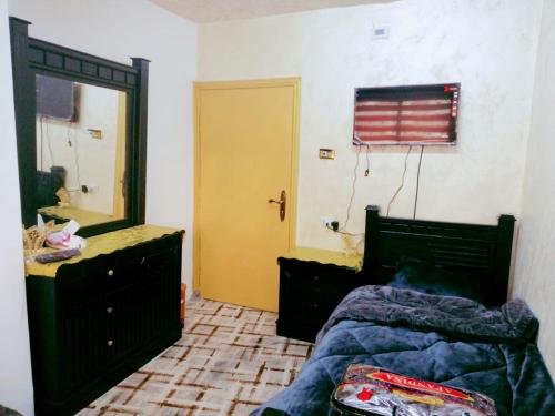 Postel nebo postele na pokoji v ubytování hostel ـ Karak dream