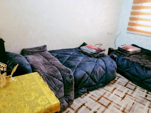 Postel nebo postele na pokoji v ubytování hostel ـ Karak dream