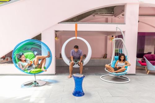 a group of people sitting in chairs in a room at Abraham Eilat in Eilat