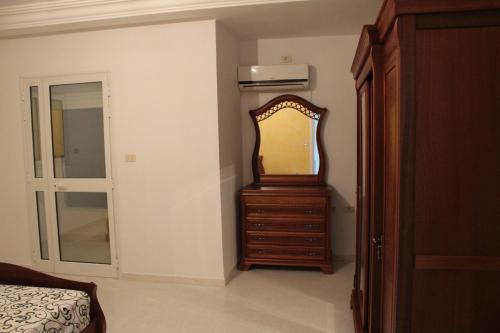 Cama o camas de una habitación en LE JASMIN RESIDENCE bord de mer