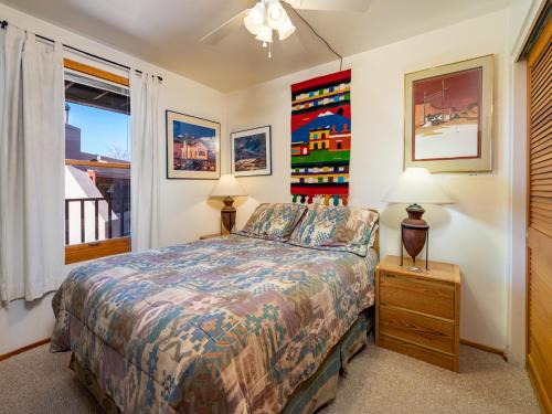 a bedroom with a bed and a window at Cielo Grande 305, 2 Bedrooms, HDTV, Pet Friendly, Sleeps 6 in Santa Fe