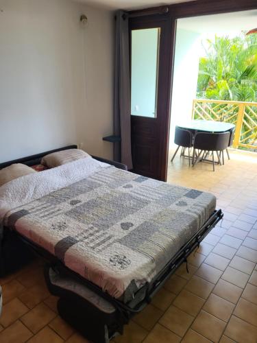 Postel nebo postele na pokoji v ubytování Studio confort proche de la mer