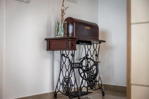 a side table with aperatureperature at Apartmani Pero Dido in Rab