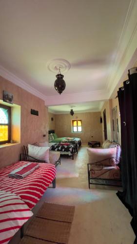 Un ou plusieurs lits dans un hébergement de l'établissement Riad Heermans