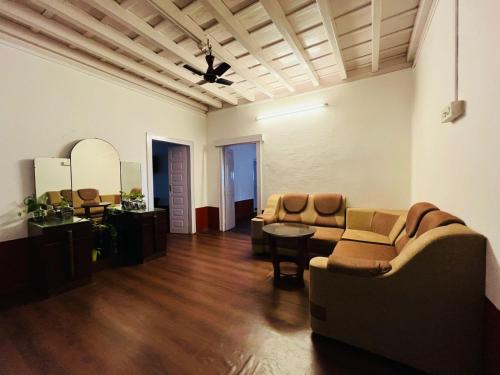 Χώρος καθιστικού στο Coorg Daffodil Guesthouse