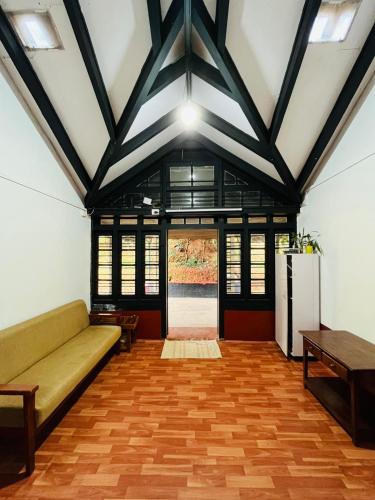Χώρος καθιστικού στο Coorg Daffodil Guesthouse