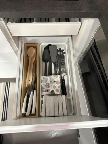 a refrigerator filled with lots of kitchen utensils at City Fun in Rovigo