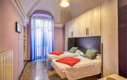 Rúm í herbergi á Stunning Home In Villanova Dalbenga With Wifi And 2 Bedrooms