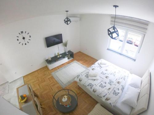 Ένα ή περισσότερα κρεβάτια σε δωμάτιο στο Apartman Lana