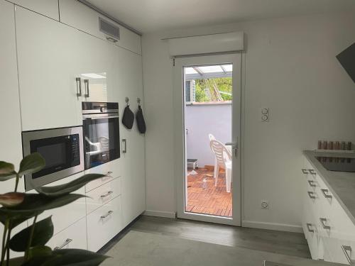 Dapur atau dapur kecil di Maisonnette avec terrasse