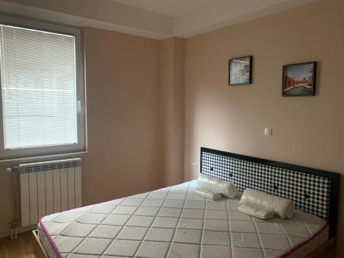 Postel nebo postele na pokoji v ubytování Cosy new apartment