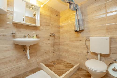 Koupelna v ubytování Radic Rooms