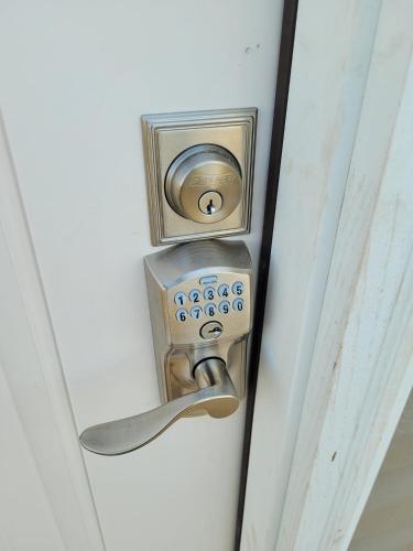 a door handle with a lock on a door at GREAT Little Guest Suite with Private Entry & Deck! Pet Friendly & 30 Mins to Nashville! in Ashland City