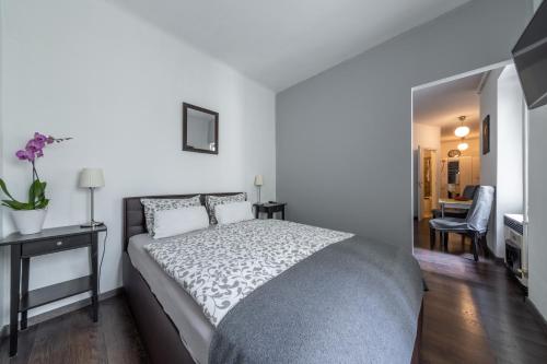 Llit o llits en una habitació de Margit Apartment
