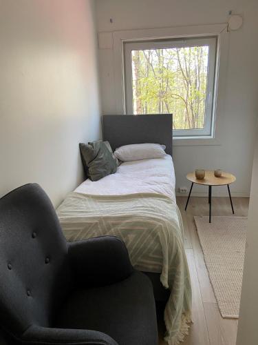 A bed or beds in a room at Liten koselig hybel i Gamle Oslo