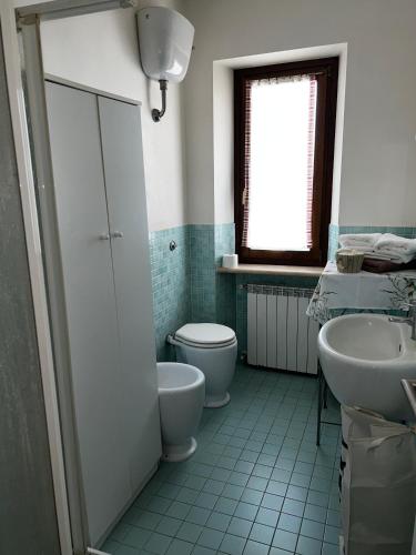 Ένα μπάνιο στο VILLINO CARLOTTA - Parking for bike - relax - spazio - garden - privacy -