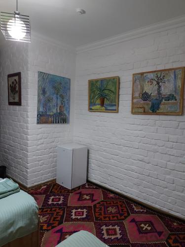 Ένα ή περισσότερα κρεβάτια σε δωμάτιο στο MUSAVVIR