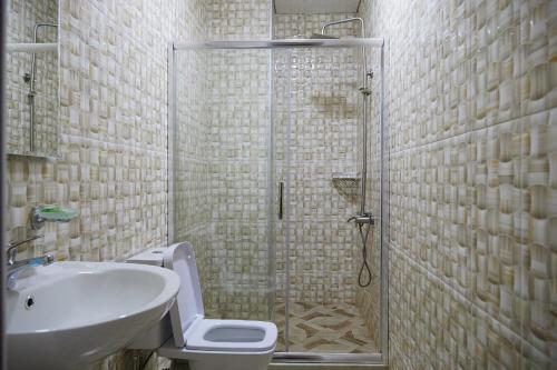 Koupelna v ubytování HOTEL LORD
