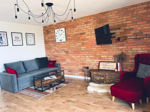 Ruang duduk di Skoczybruzda Apartamenty