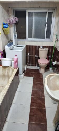 a bathroom with a toilet and a sink at "sara accommodation room "no Egyptians "Dormitory room in Cairo