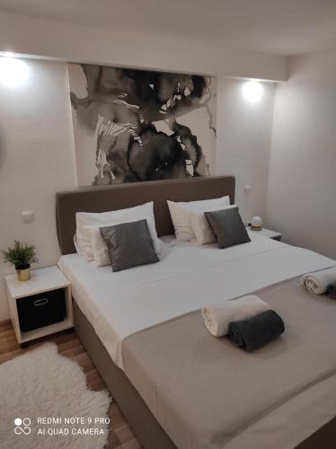 Ένα ή περισσότερα κρεβάτια σε δωμάτιο στο Suite4you