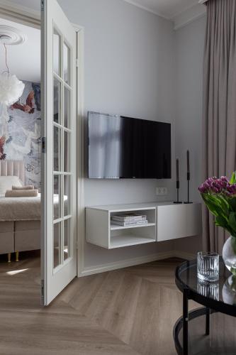 TV tai viihdekeskus majoituspaikassa Fresh unit, high quality design.