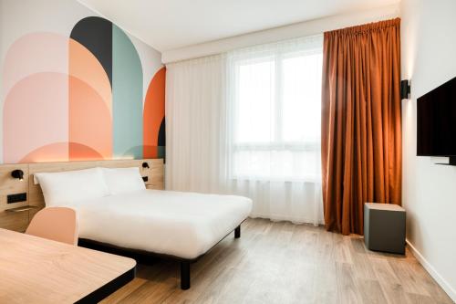 Postel nebo postele na pokoji v ubytování B&B HOTEL Namur
