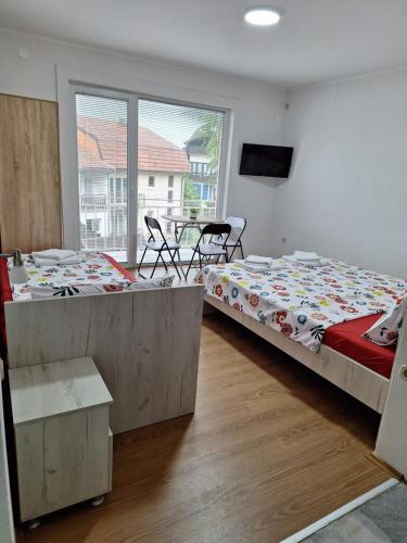 Cama o camas de una habitación en Apartments Meshko