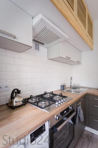 Η κουζίνα ή μικρή κουζίνα στο Apartament Studio 24