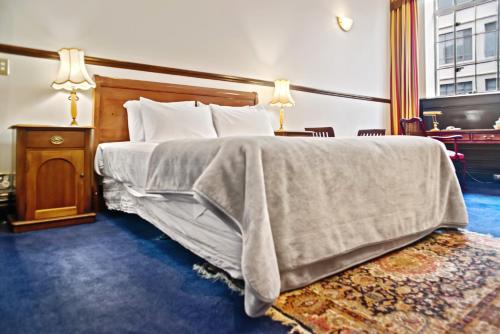 Letto o letti in una camera di Wellesley Boutique Hotel