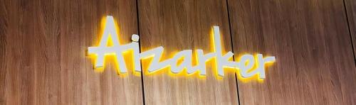 a painting of the word kffiti on a wooden wall at Aizarker in La Plata