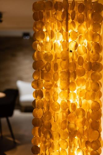a bunch of lights that are on a wall at Chez Blanche in Waterloo