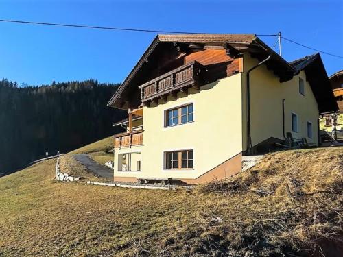 a house on the side of a hill at Wirnsberg in Aschbach