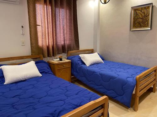 Postel nebo postele na pokoji v ubytování 3bedroom family apartment