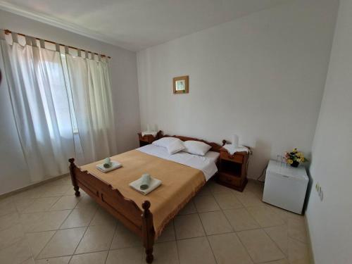 a bedroom with a bed with two dishes on it at Villa Gabriel in Pag