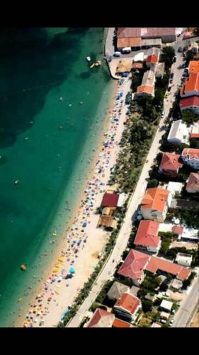 an aerial view of a beach with buildings and the water at Villa Gabriel in Pag