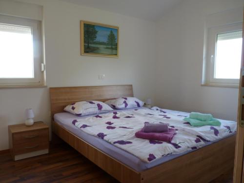 מיטה או מיטות בחדר ב-Apartment Adriatic