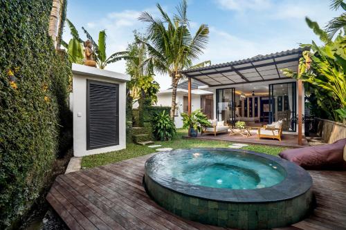 Πισίνα στο ή κοντά στο Kaori Loft by Alfred in Bali