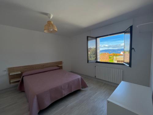 Posteľ alebo postele v izbe v ubytovaní Casa Rosquillas