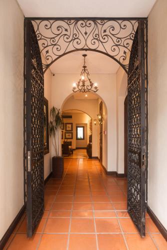 an entrance to a hallway with an open door at Hotel Boutique Balcón de la Plaza in Salta