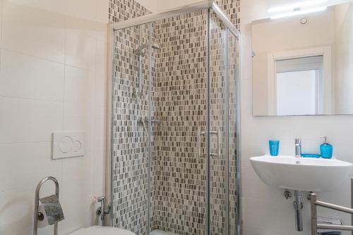 a bathroom with a shower and a sink at MARIMAR - Apartments OTRANTO in Otranto