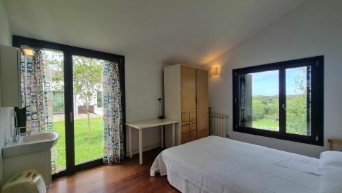 Ένα ή περισσότερα κρεβάτια σε δωμάτιο στο Casa vacacional el Pandu