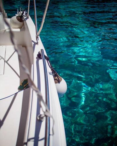 a close up of the side of a boat in the water at Il Moro in Carini