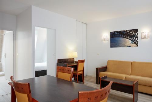 Χώρος καθιστικού στο Aparthotel Adagio Access Paris Philippe Auguste