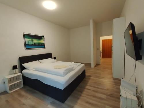 Ένα ή περισσότερα κρεβάτια σε δωμάτιο στο Apartment in Stadtnähe