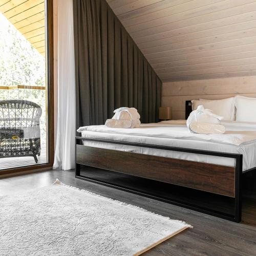 Postel nebo postele na pokoji v ubytování Green Hills Resort Uzbekistan