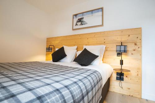 Кровать или кровати в номере Les Roches du Mont Blanc